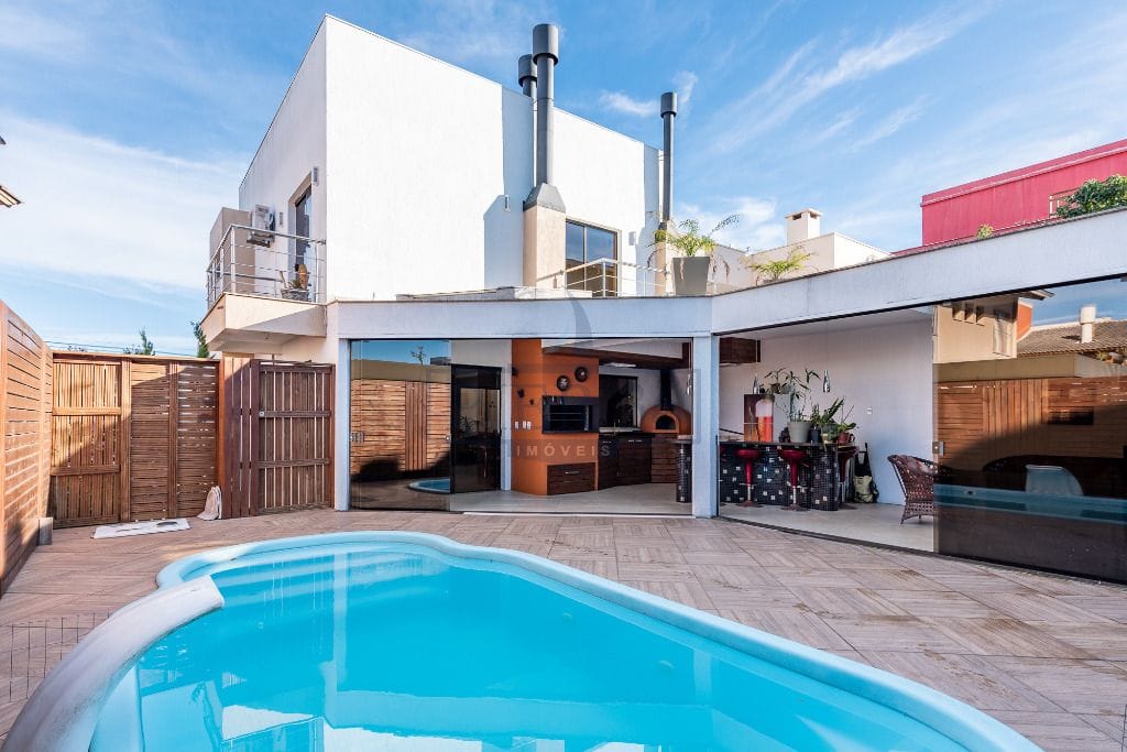 Casa em Condomínio à venda com 270m², 3 dormitórios, 3 suítes, 3 vagas no bairro Hípica em Porto Alegre - Foto 1