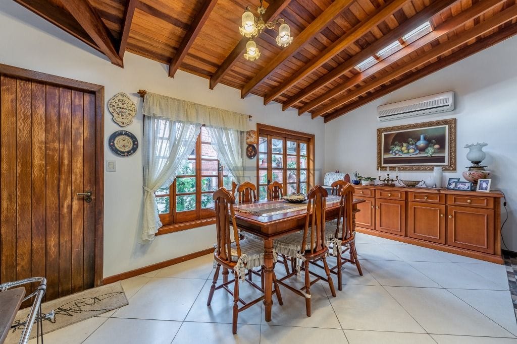 Casa em Condomínio à venda com 155m², 3 dormitórios, 1 suíte, 2 vagas no bairro Cavalhada em Porto Alegre - Foto 1