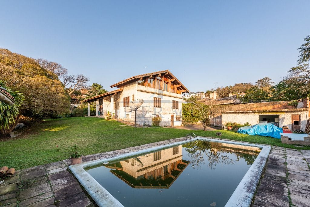 Casa à venda com 1000m², 3 dormitórios, 3 suítes no bairro Tristeza em Porto Alegre - Foto 1