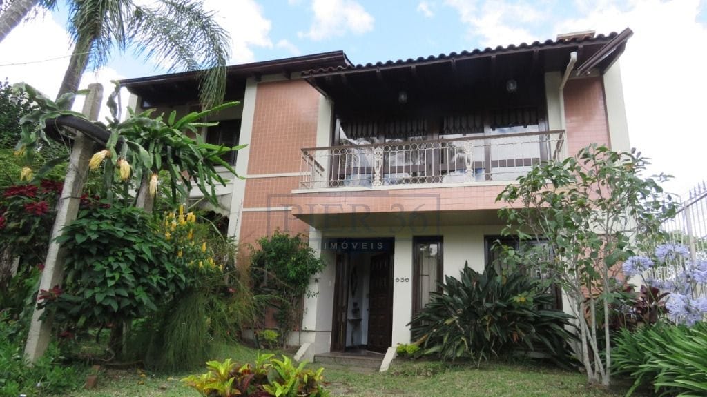 Casa à venda com 484m², 4 dormitórios, 1 suíte, 3 vagas no bairro Cristal em Porto Alegre - Foto 1