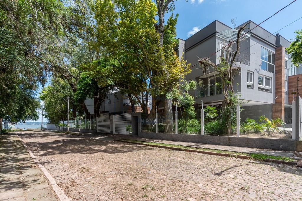 Casa em Condomínio à venda com 306m², 4 dormitórios, 4 suítes, 3 vagas no bairro Tristeza em Porto Alegre - Foto 1