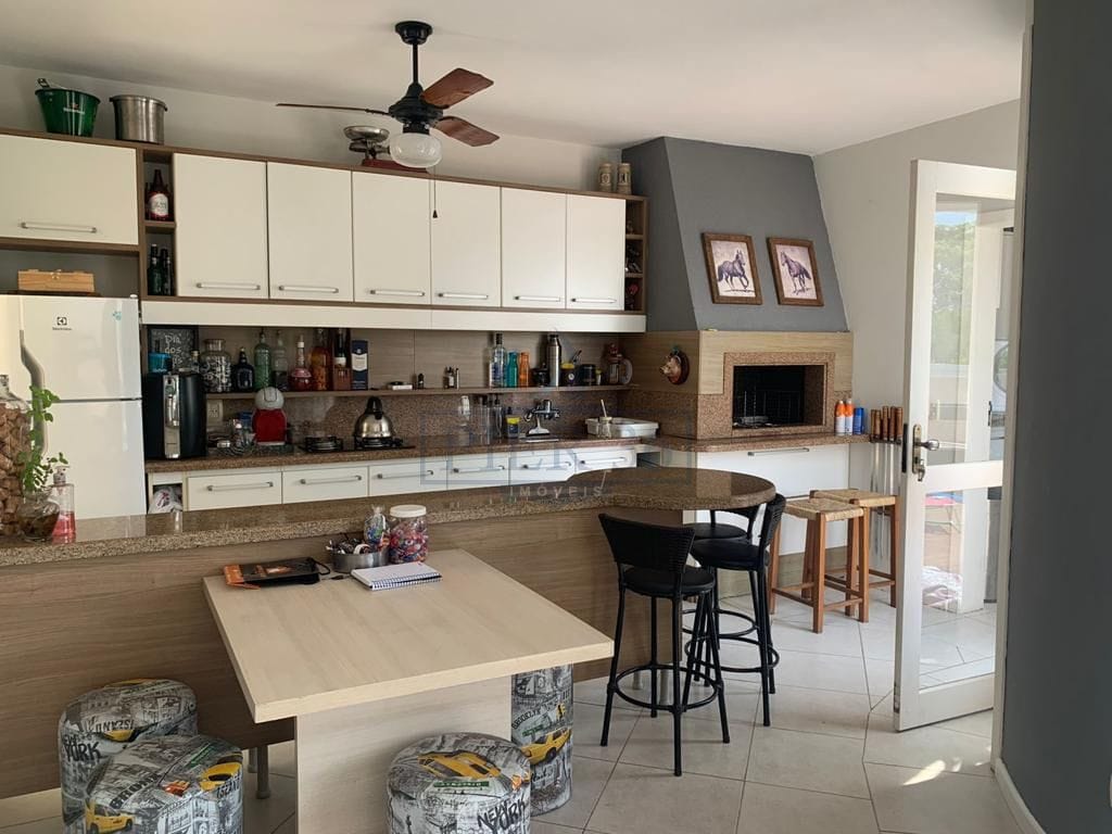 Casa em Condomínio à venda com 173m², 4 dormitórios, 3 suítes, 2 vagas no bairro Hípica em Porto Alegre - Foto 1