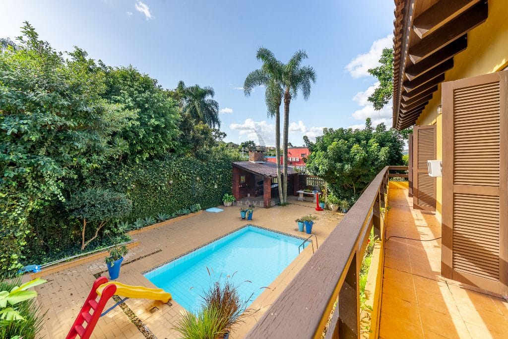 Casa em Condomínio à venda com 400m², 5 dormitórios, 2 suítes, 4 vagas no bairro Cavalhada em Porto Alegre - Foto 1