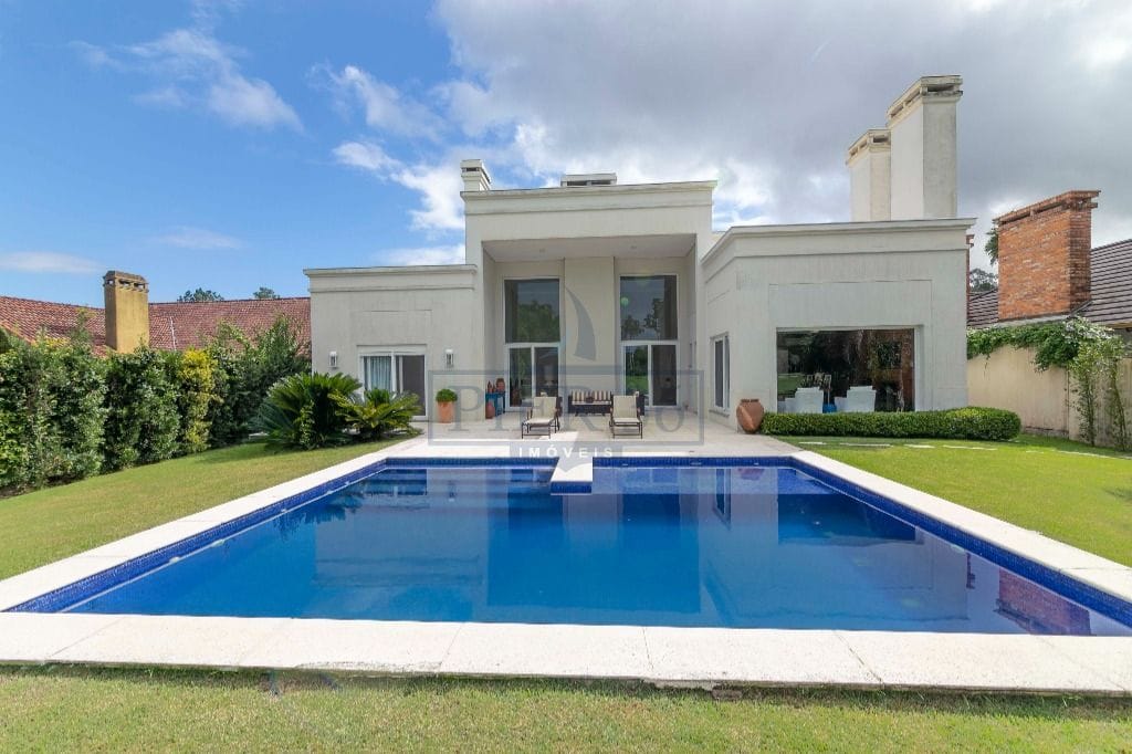 Casa em Condomínio à venda com 550m², 3 dormitórios, 3 suítes, 4 vagas no bairro Terraville em Porto Alegre - Foto 1