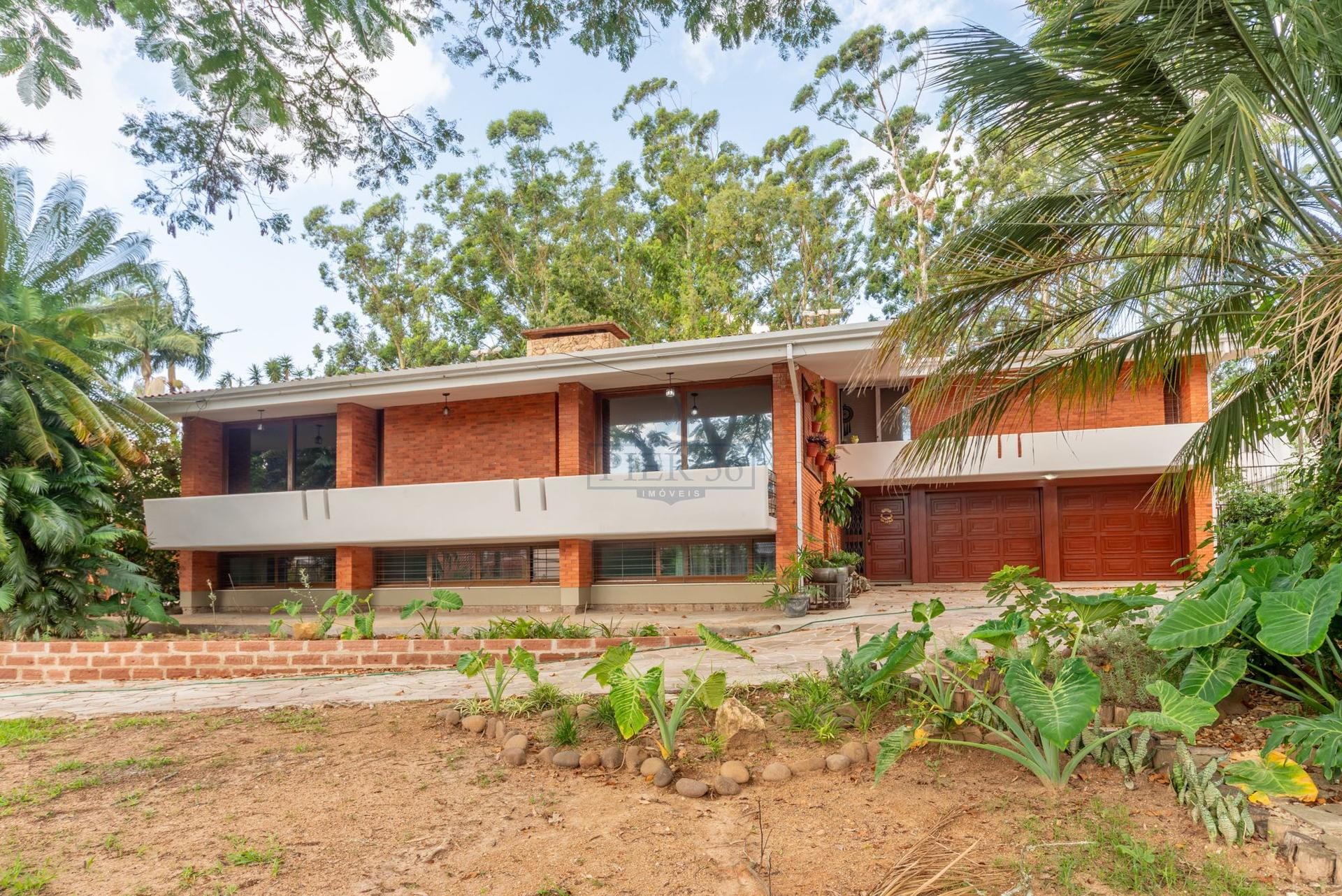 Casa à venda com 600m², 4 dormitórios, 3 suítes, 8 vagas no bairro Jardim Isabel em Porto Alegre - Foto 1