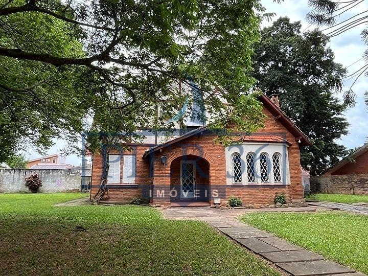 Casa à venda com 480m², 4 dormitórios, 2 suítes, 2 vagas no bairro Vila Assunção em Porto Alegre - Foto 1
