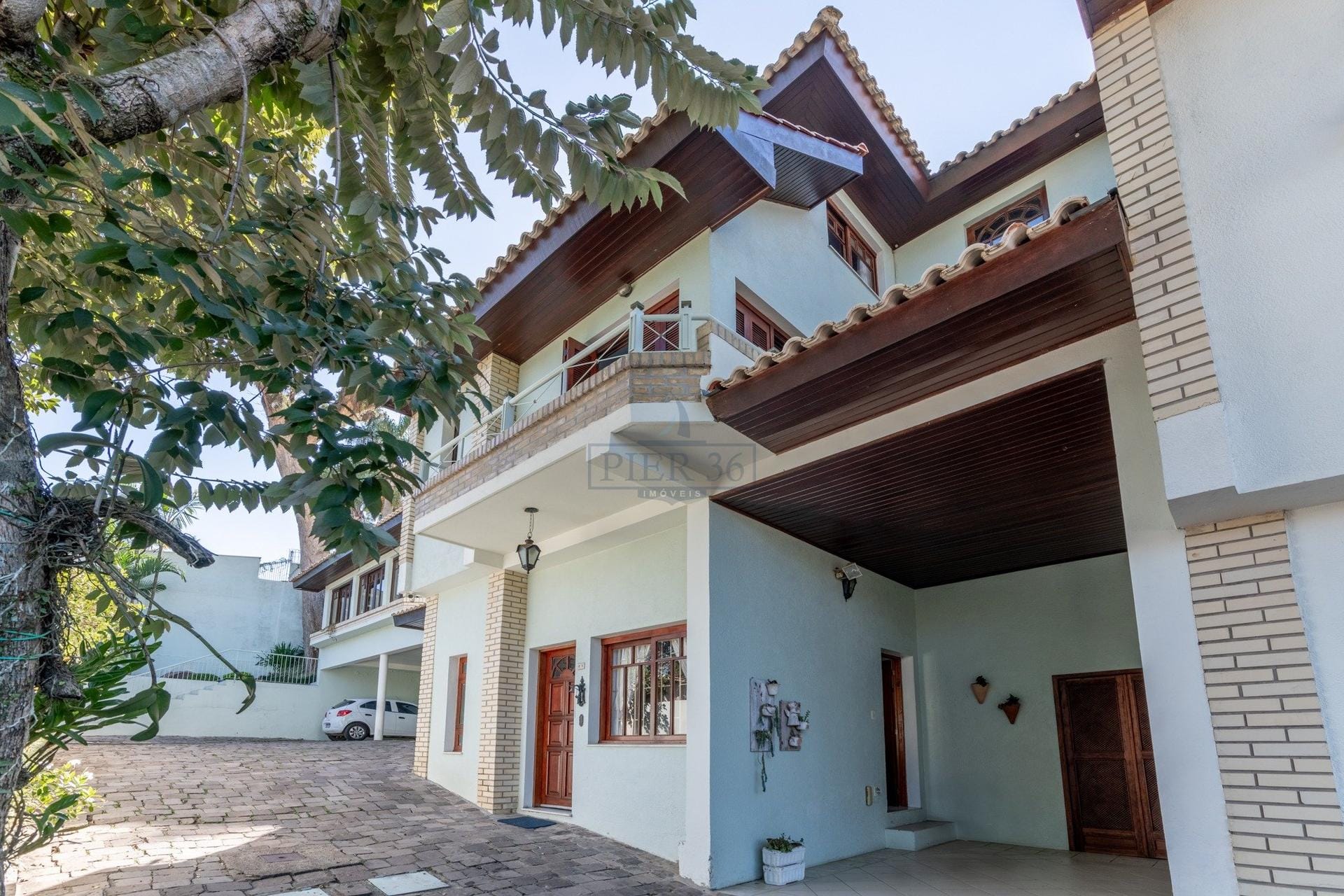 Casa em Condomínio à venda com 225m², 3 dormitórios, 1 suíte, 2 vagas no bairro Jardim Isabel em Porto Alegre - Foto 1