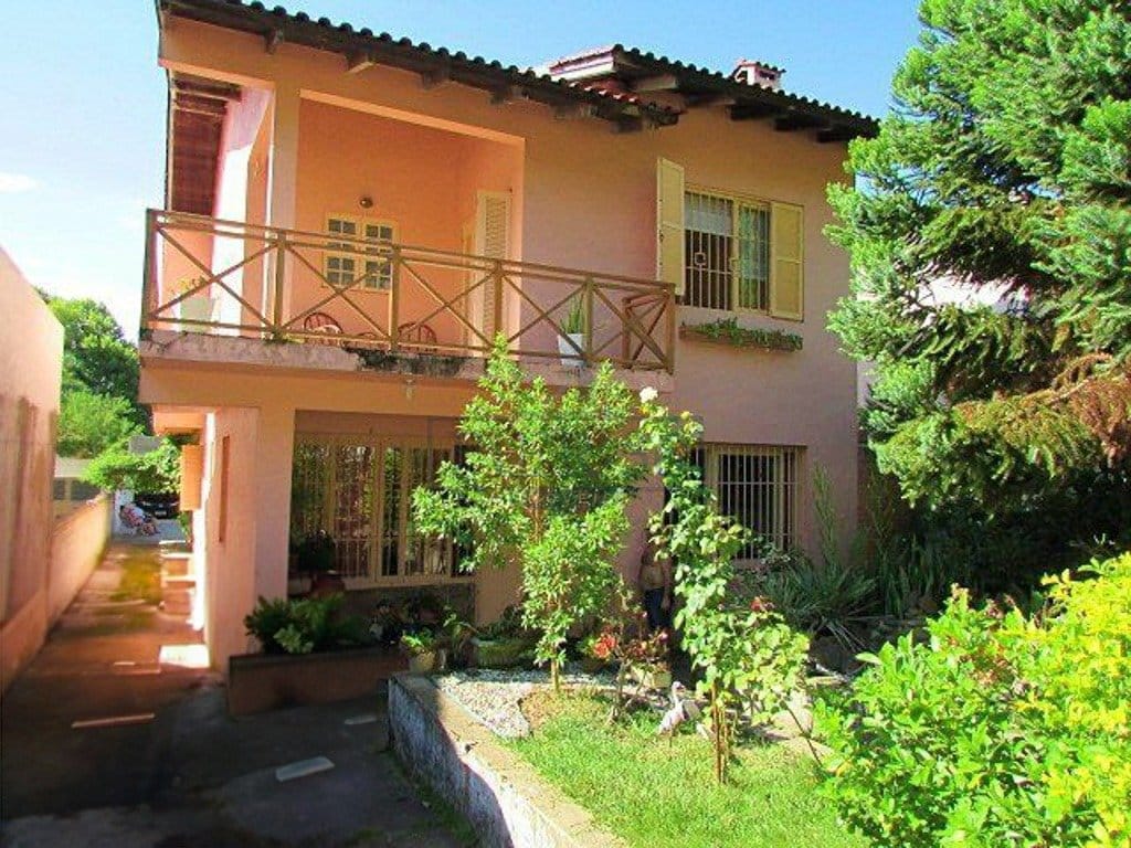 Casa à venda com 408m², 6 dormitórios, 1 suíte, 6 vagas no bairro Vila Conceição em Porto Alegre - Foto 1