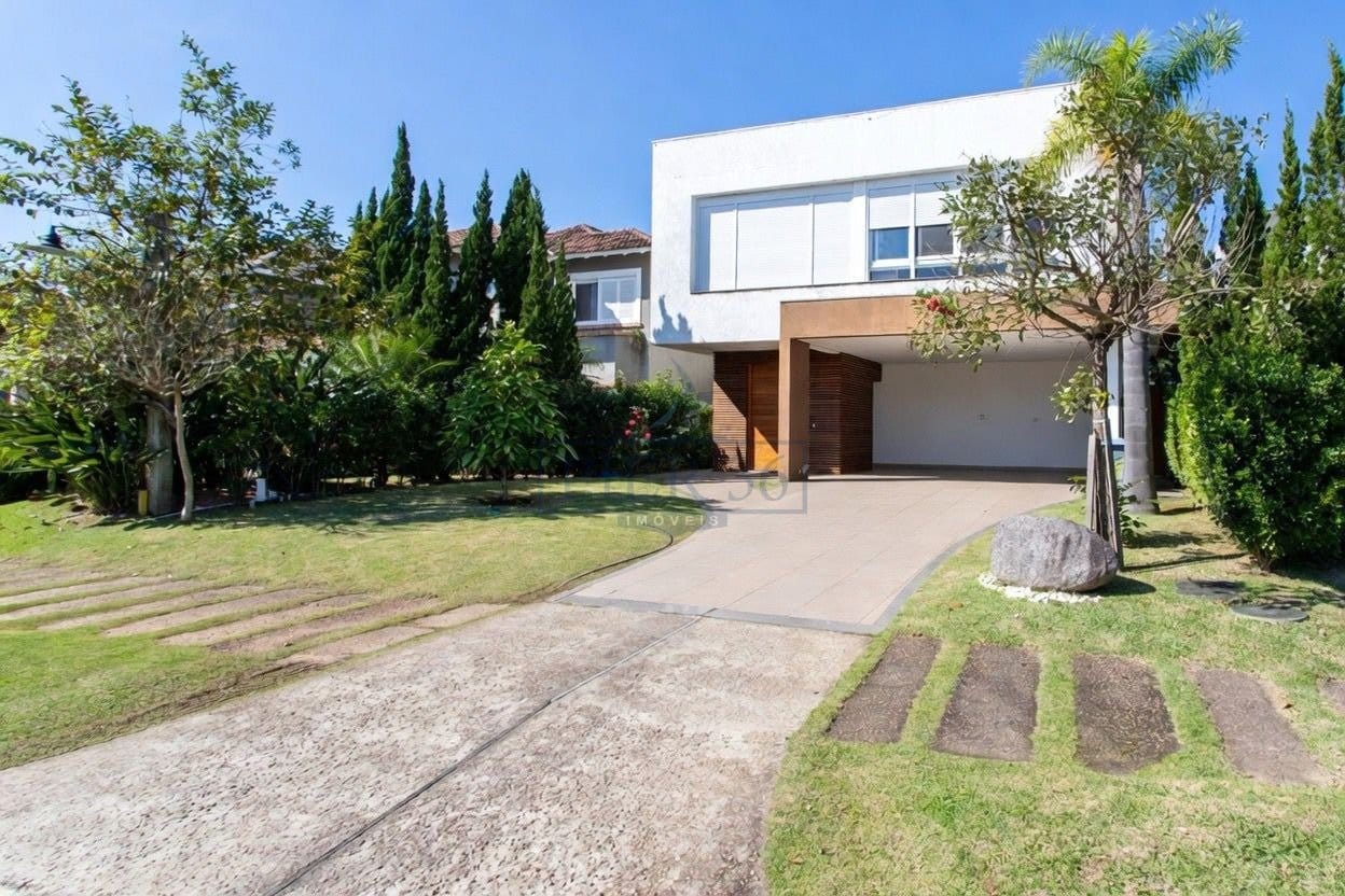 Casa em Condomínio à venda com 426m², 3 dormitórios, 3 suítes, 3 vagas no bairro Terraville em Porto Alegre - Foto 1