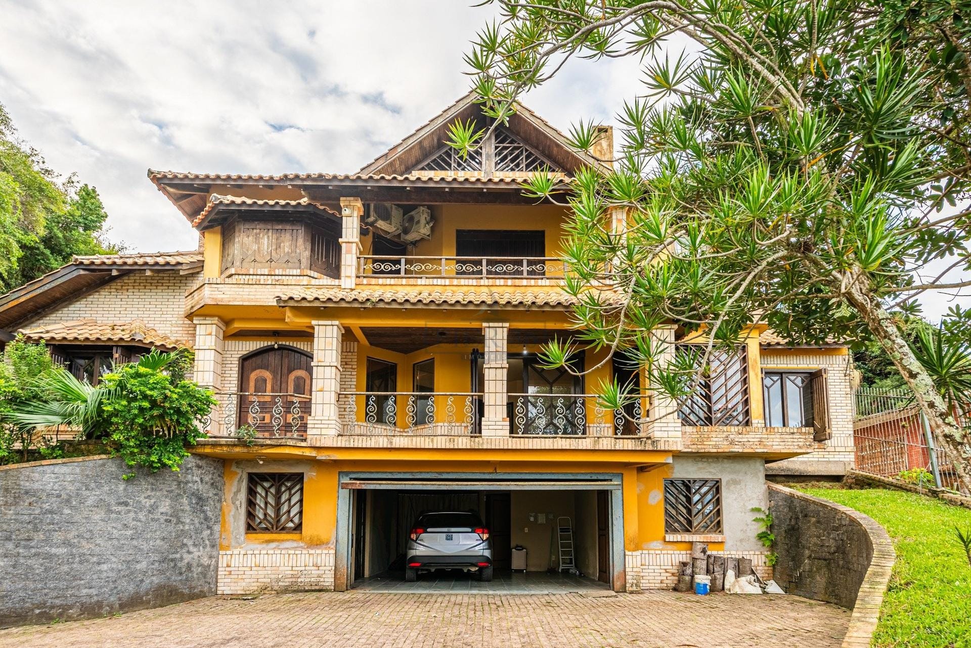 Casa à venda com 342m², 5 dormitórios, 5 suítes, 6 vagas no bairro Vila Conceição em Porto Alegre - Foto 1