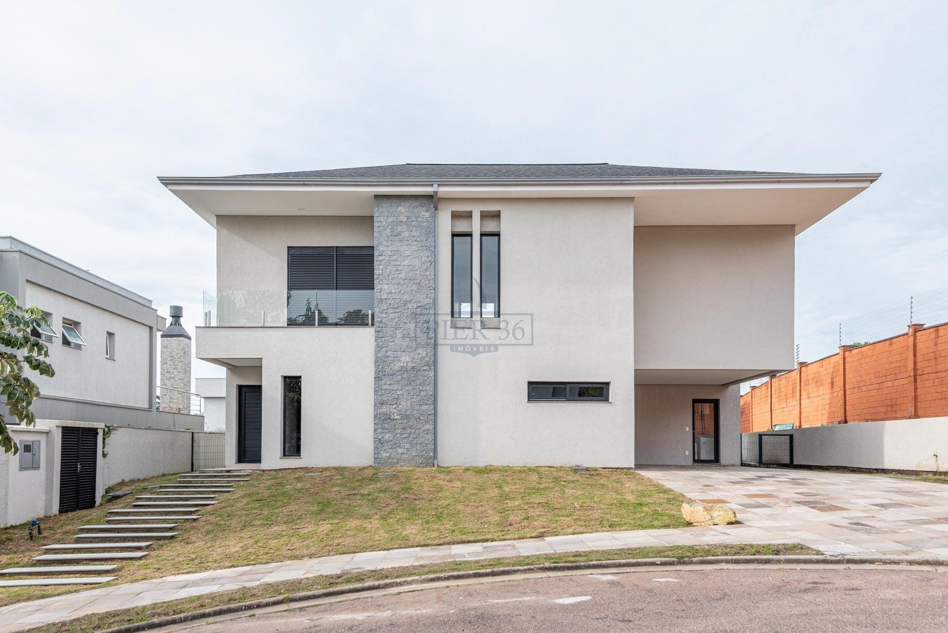 Casa em Condomínio à venda com 314m², 3 dormitórios, 3 suítes, 2 vagas no bairro Vila Nova em Porto Alegre - Foto 1