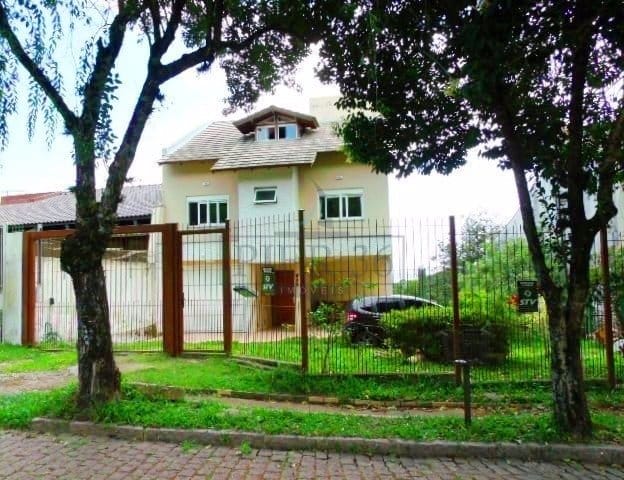 Casa à venda com 300m², 3 dormitórios, 1 suíte, 4 vagas no bairro Jardim Isabel em Porto Alegre - Foto 1