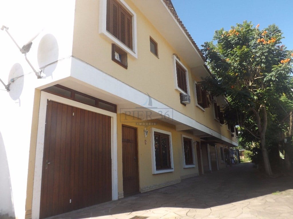 Casa em Condomínio à venda com 165m², 3 dormitórios, 1 suíte, 3 vagas no bairro Ipanema em Porto Alegre - Foto 1