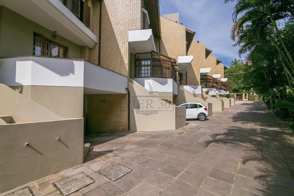 Casa em Condomínio à venda com 317m², 3 dormitórios, 3 suítes, 4 vagas no bairro Tristeza em Porto Alegre - Foto 1
