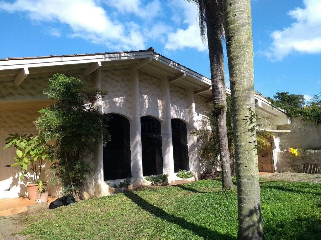 Casa à venda com 400m², 3 dormitórios, 1 suíte, 4 vagas no bairro Vila Assunção em Porto Alegre - Foto 1