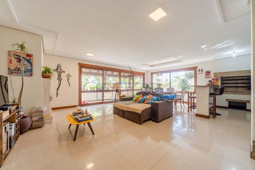 Casa em Condomínio à venda com 500m², 4 dormitórios, 4 suítes, 3 vagas no bairro Vila Assunção em Porto Alegre - Foto 1