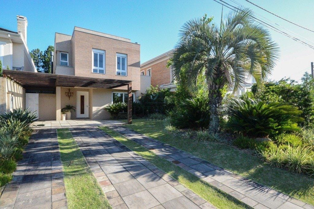 Casa em Condomínio à venda com 243m², 3 dormitórios, 3 suítes, 4 vagas no bairro Terraville em Porto Alegre - Foto 1