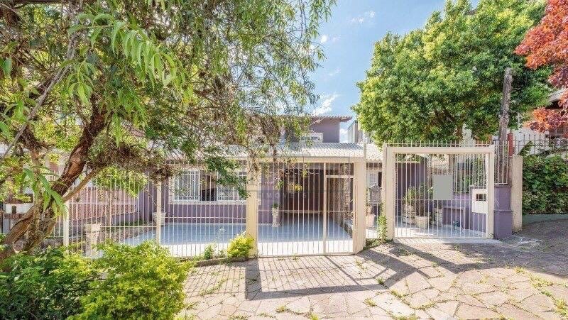 Casa à venda com 280m², 4 dormitórios, 4 suítes, 4 vagas no bairro Vila Assunção em Porto Alegre - Foto 1